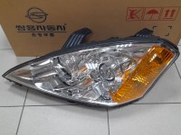 Фара передняя Kyron (желтый поворот) левая